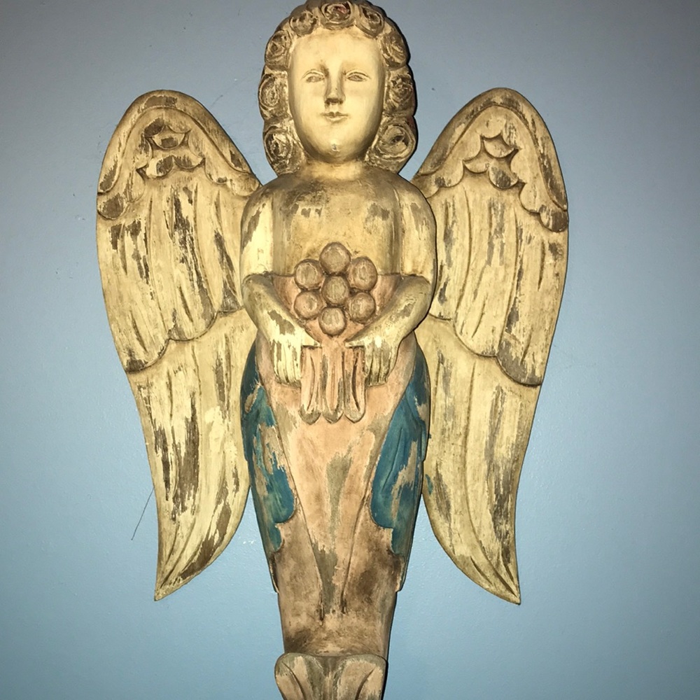 Wood carved ship Angel
